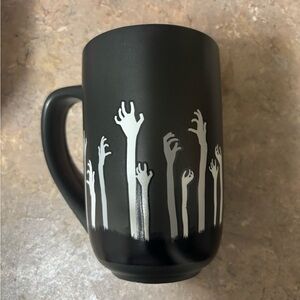 Black Ceramic Mug with White Hand Design